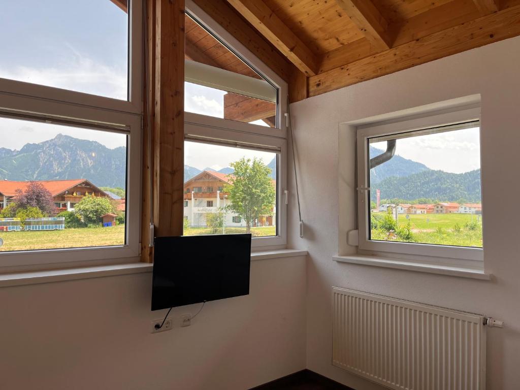 Dreibettzimmer mit Bergblick – Gästehaus Forggensee