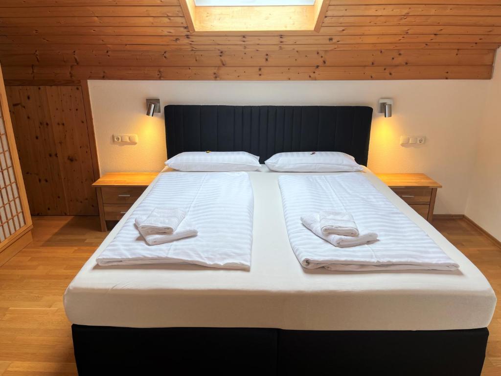 Vierbettzimmer mit Balkon – Gästehaus Forggensee